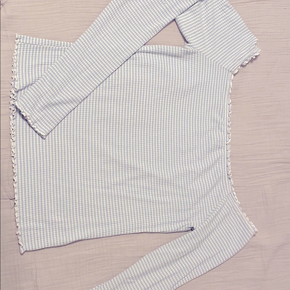 Blue and white off the shoulder long sleeve top.